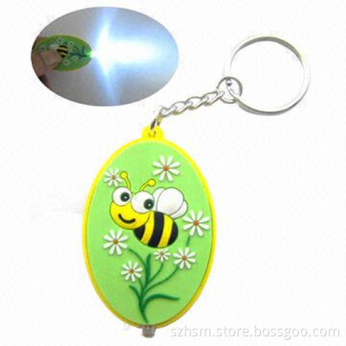 Eco-friendly Plastic Embossed Printed Flexible LED Keychain with Durable Battery